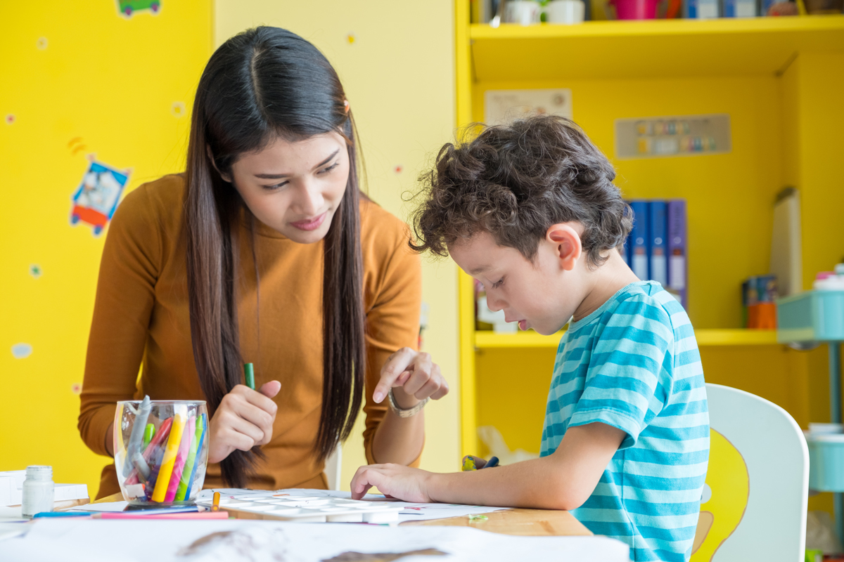 teacher with student